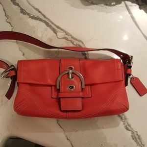 Coach leather buckle purse coral color